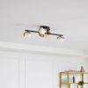 Lámparas Lucande Pallo LED ceiling lamp, linear, 4-bulb, black/gold